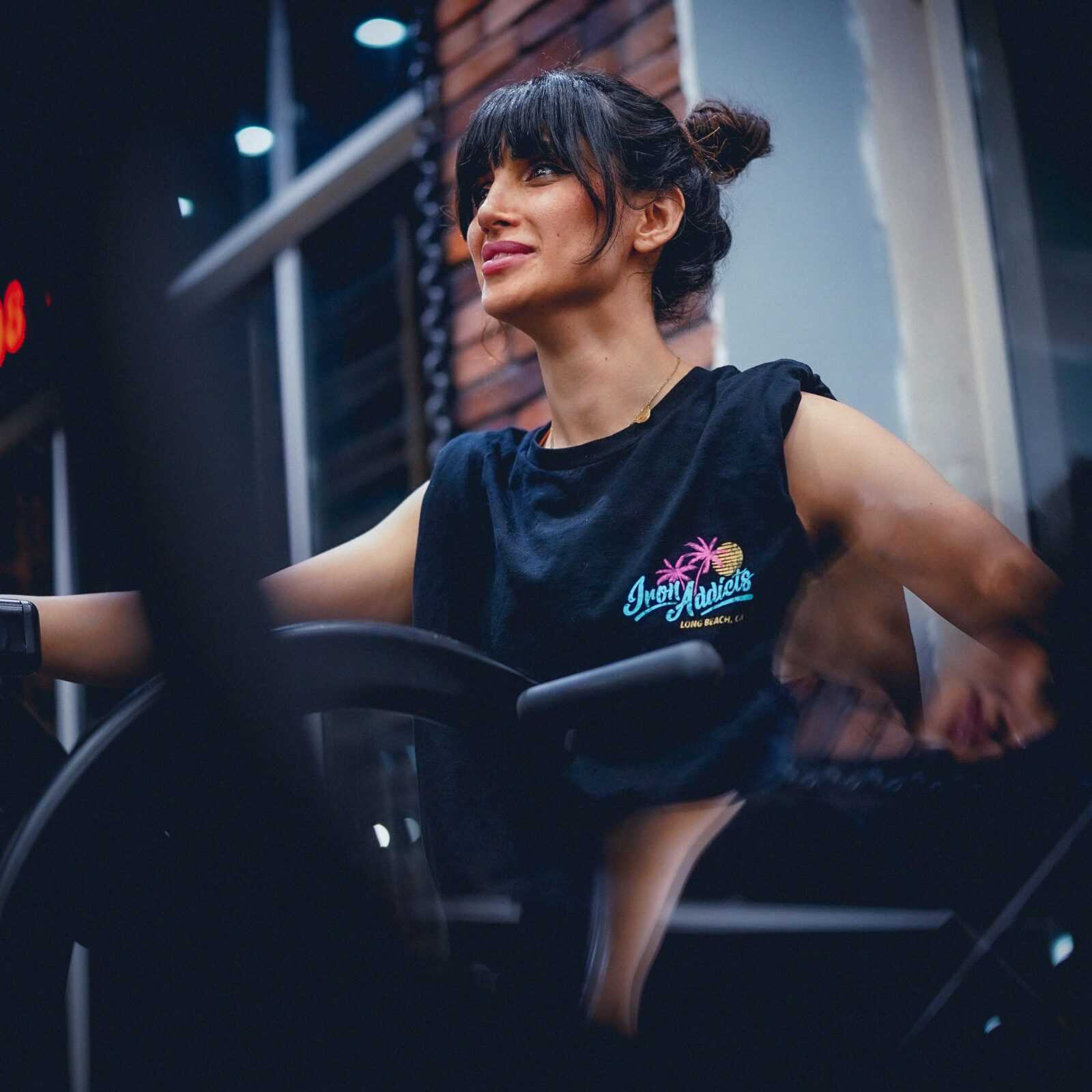A woman working out on exercise equipment at a gym in Sulaymaniyah, Kurdistan Region, Iraq.